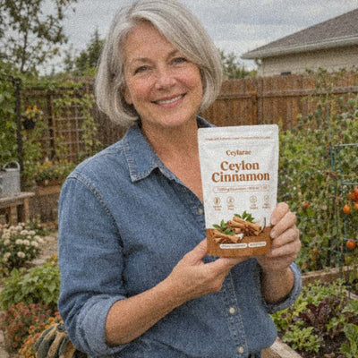 Woman in her vegetable garden holding a Ceylarae pouch