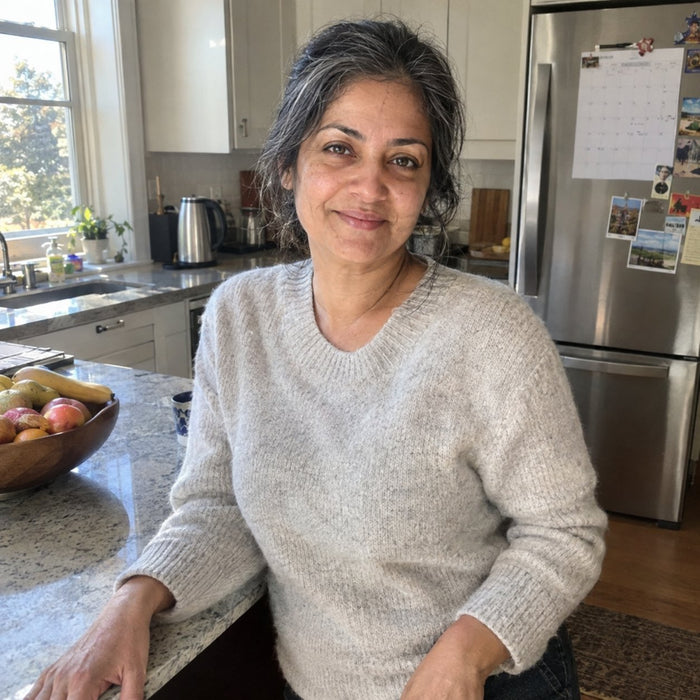 Customer in her kitchen in the morning